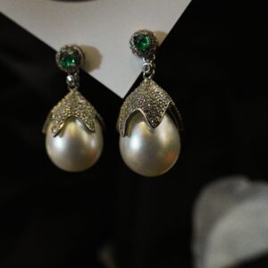 Teardrop shape south sea Astralian white pearl studs.