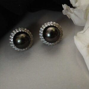 These silver studs are micropaved with white zircon and inset with dark grey Tahitian pearl 12mm